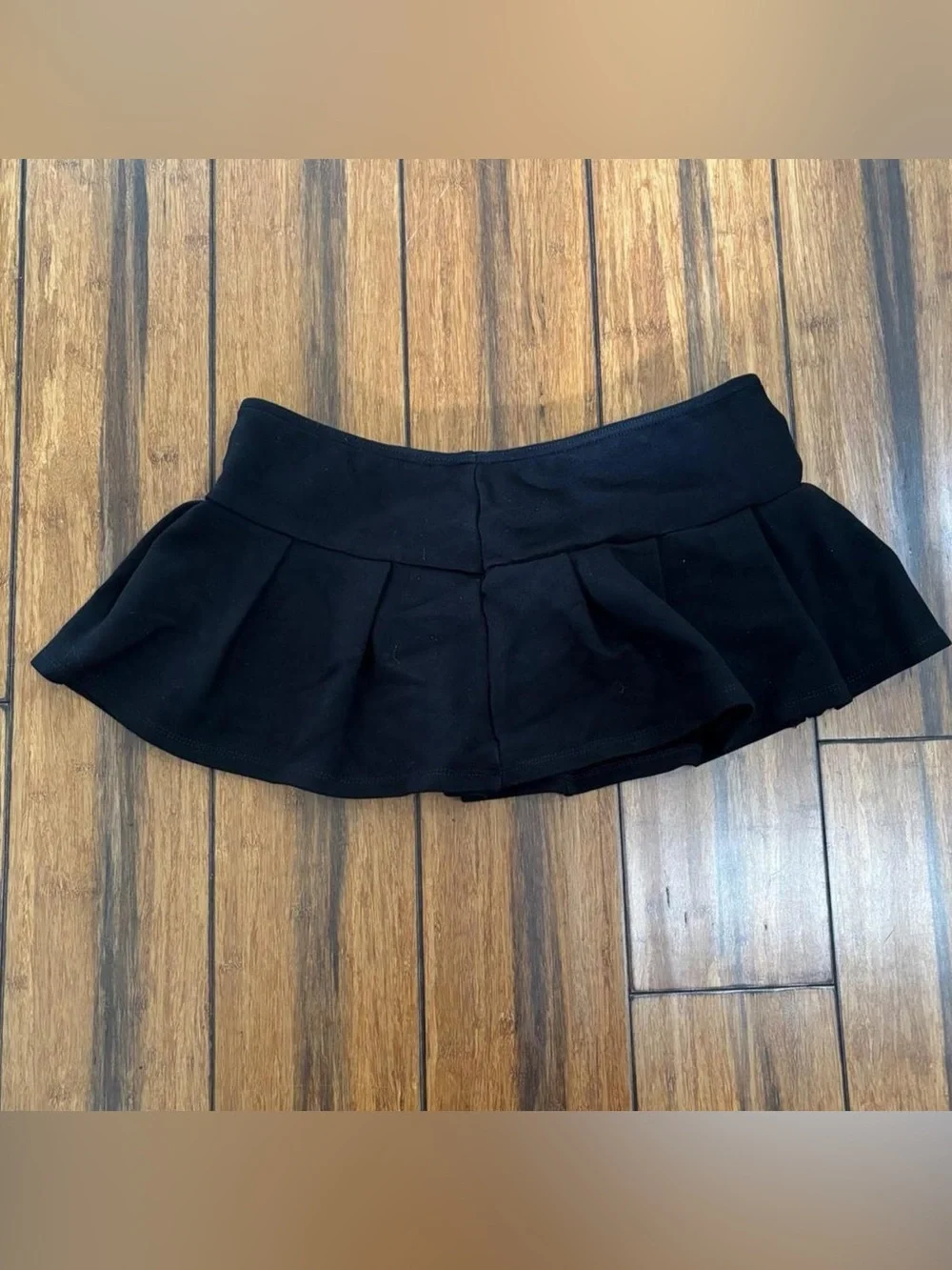 black pleated micro skirt with belt detail - urban outfitters